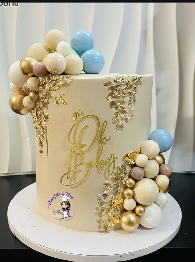 Oh Baby gold leaf baby shower cake